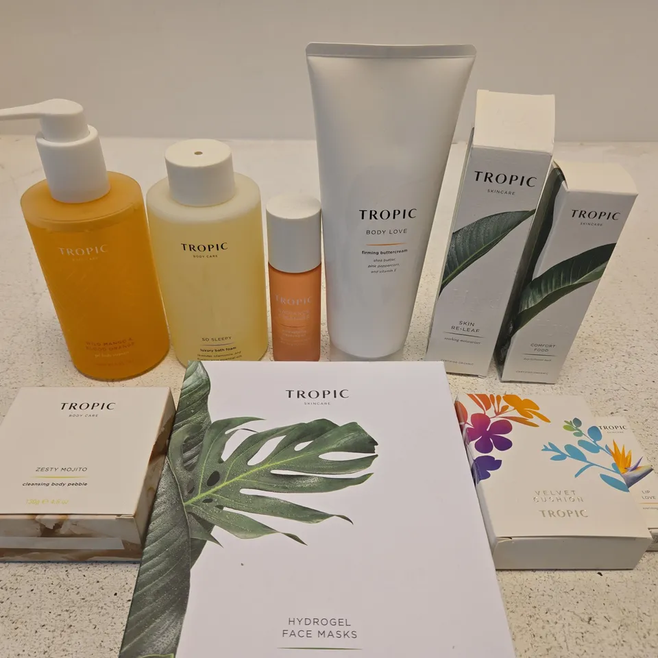 APPROX 10 ASSORTED TROPIC PRODUCTS TO INCLUDE BATH FOAM, BODY PEBBLE, HYDRATION MASK, ETC 