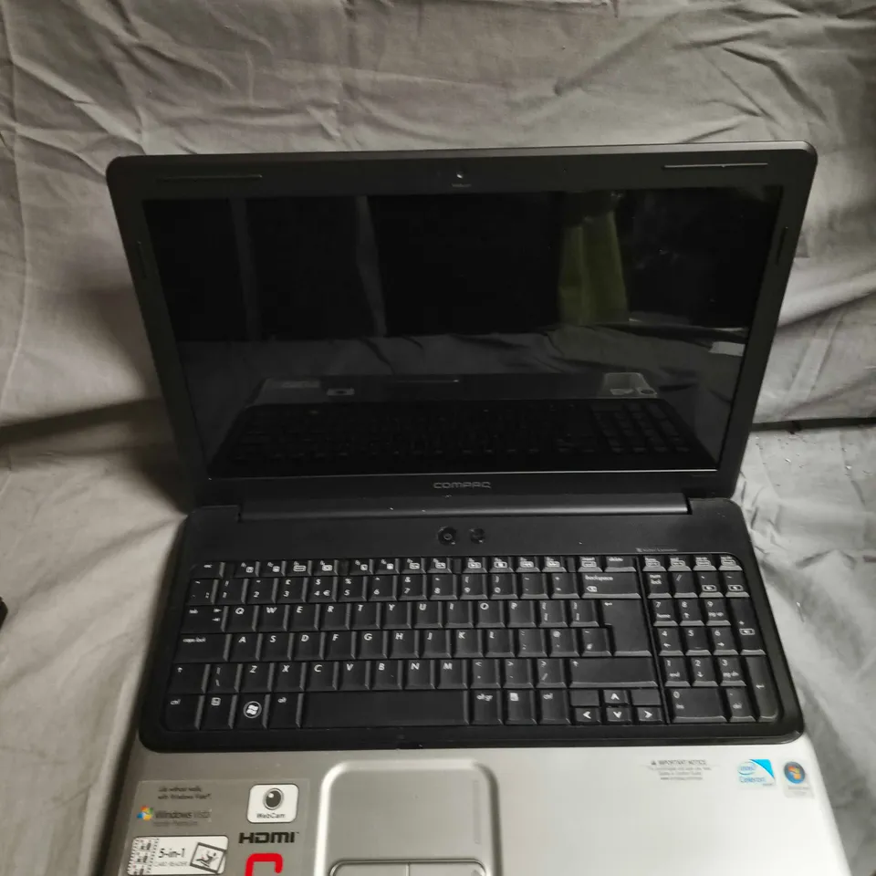 HP COMPAQ LAPTOP – BLACK, WINDOWS VISTA ERA STICKERS