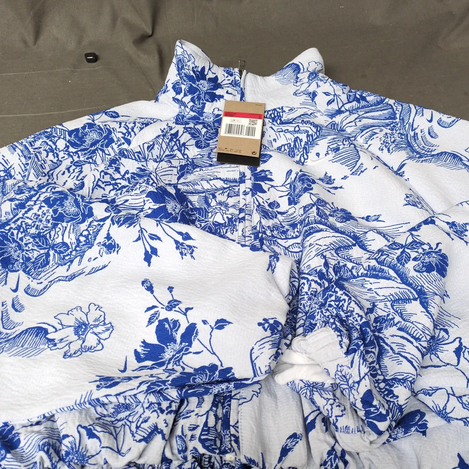 NIKE MOVE TO ZERO WOMEN'S FLORAL PRINT ZIP-UP HOODIE – OVERSIZED FIT, LARGE