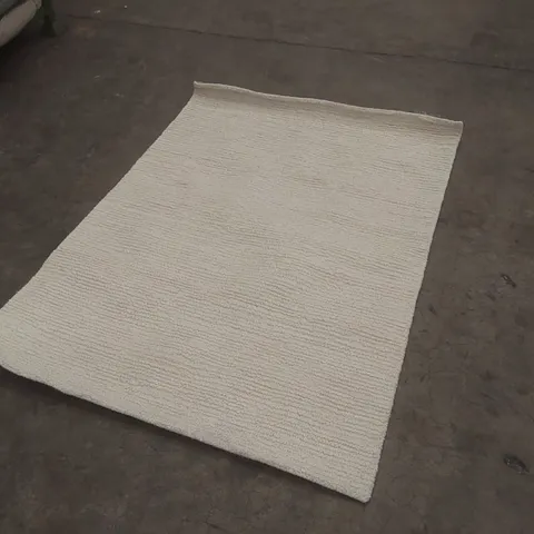BEIGE WOVEN AREA RUG - APPROXIMATELY 165 X 120CM