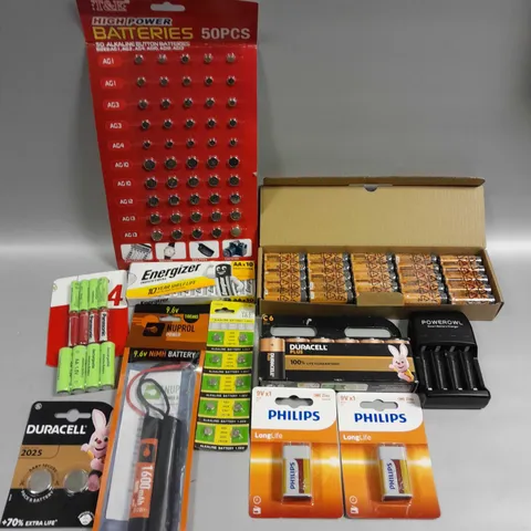 APPROXIMATELY 40 ASSORTED BATTERY PRODUCTS TO INCLUDE AA, BUTTON CELL, 9V ETC