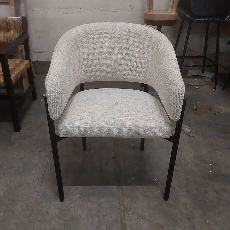 DESIGNER UPHOLSTERED ARMCHAIR WITH METAL BASE