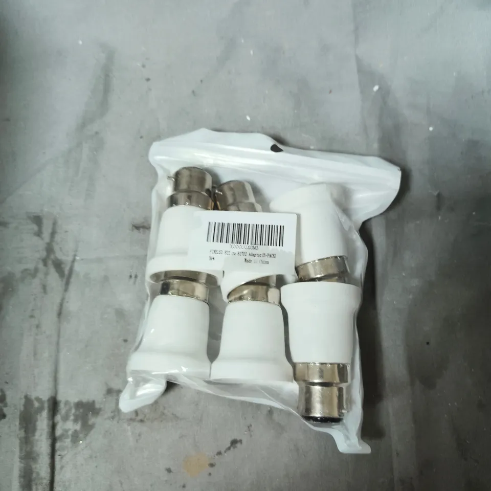 APPROXIMATELY 20 ASSORTED ITEMS INCLUDING REXEL STAPLES , BLOOD GLUCOSE TEST STRIPS AND LIGHT BULB FITTINGS 