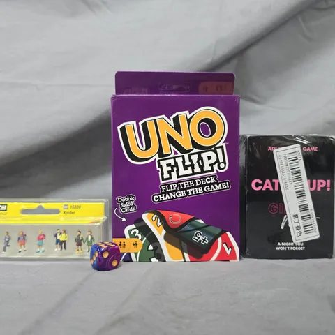 APPROXIMATELY 10 ASSORTED TOYS AND GAMES TO INCLUDE UNO FLIP, ETC