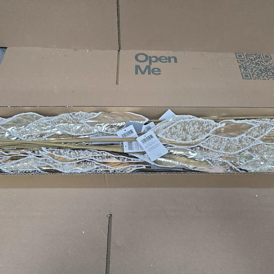 BOX OF APPROXIMATELY 12 GISELA GRAHAM WHITE AND GOLD FAUX LEAF ARRANGEMENTS