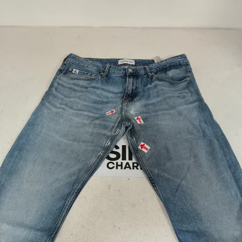 CALVIN KLEIN LIGHT DENIM JEANS SIZE 34R