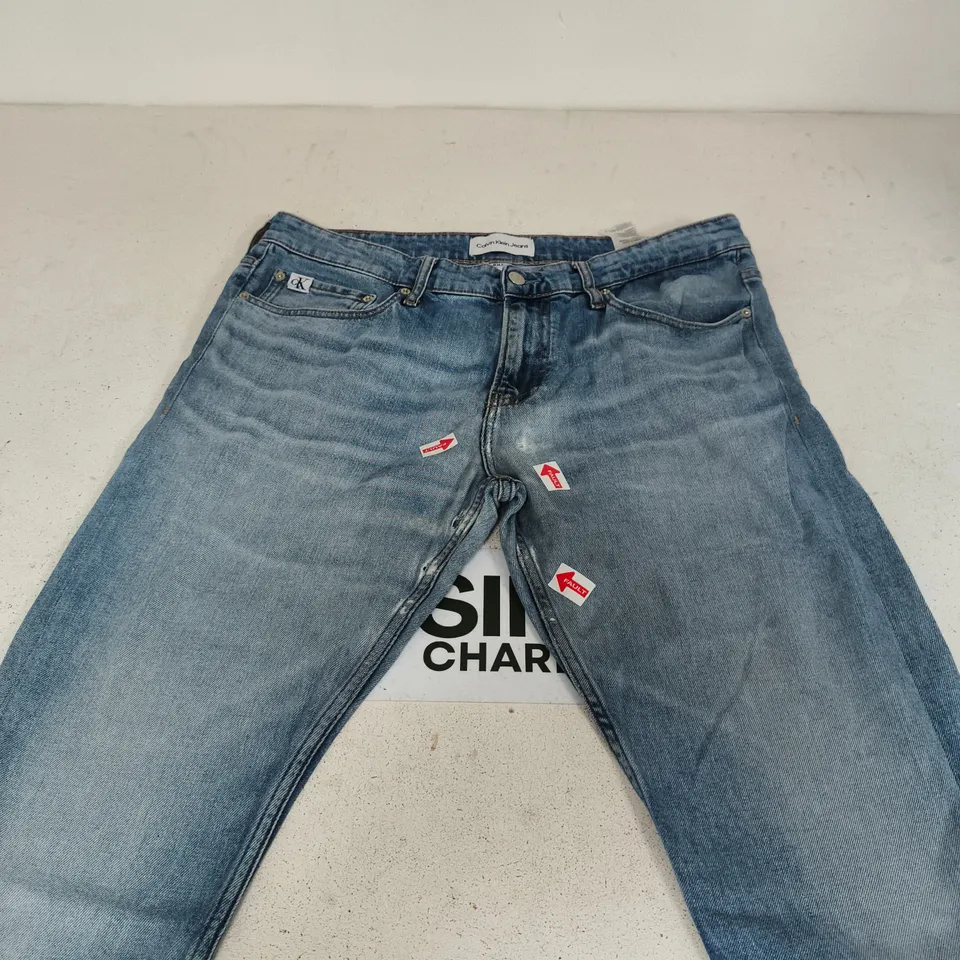 CALVIN KLEIN LIGHT DENIM JEANS SIZE 34R