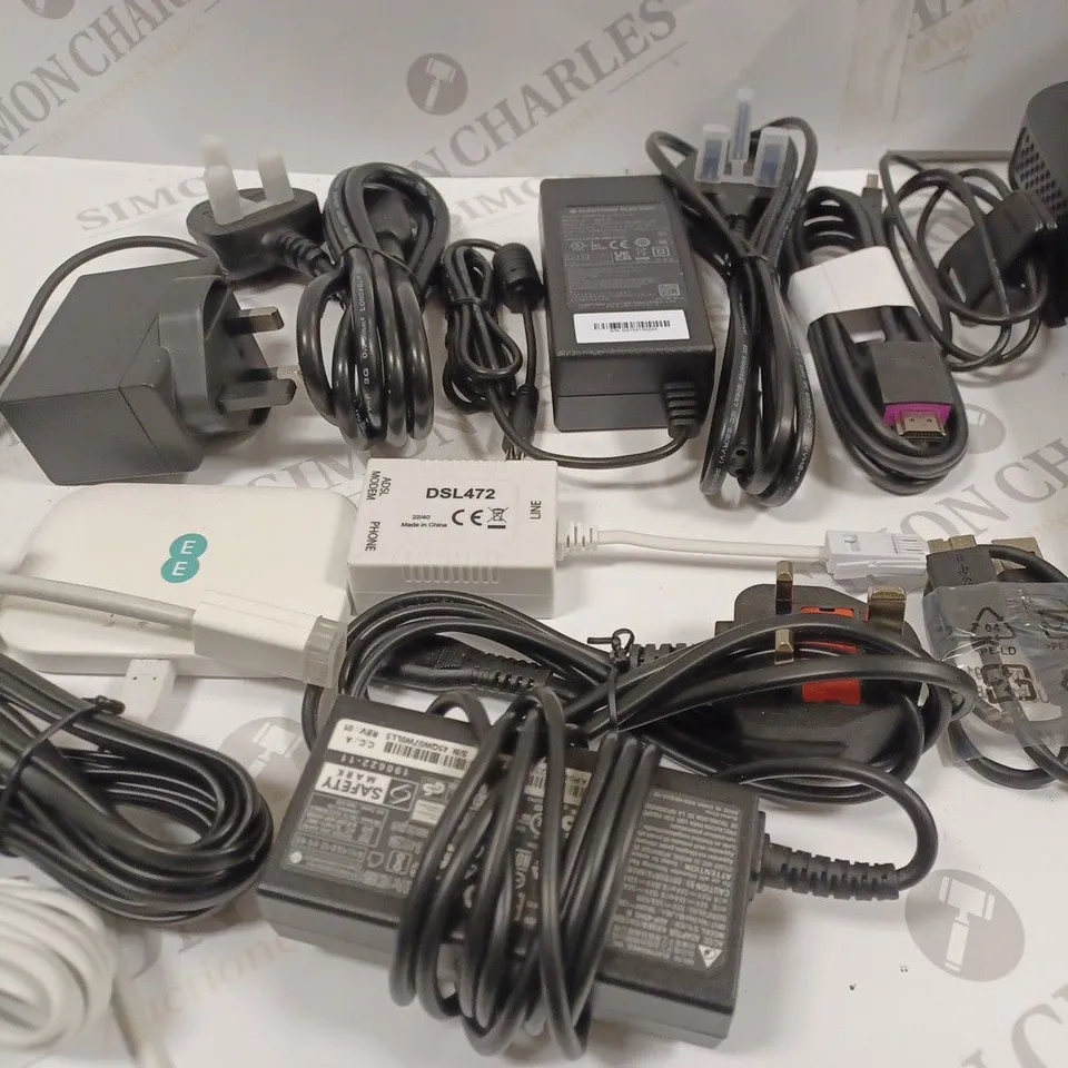 LOT OF ASSORTED TECH ITEMS TO INCLUDE SKY SET TOP BOXES AND VARIOUS CHARGERS AND CONNECTIVITY CABLES
