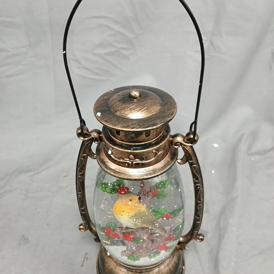BRASS-TONED GLASS HURRICANE LANTERN WITH DECORATIVE BIRD SCENE