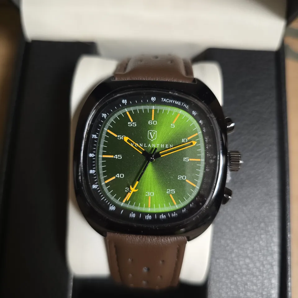 VONLANTHEN AVIATION WATCH FEATURING A GREEN DIAL AND A BROWN LEATHER STRAP