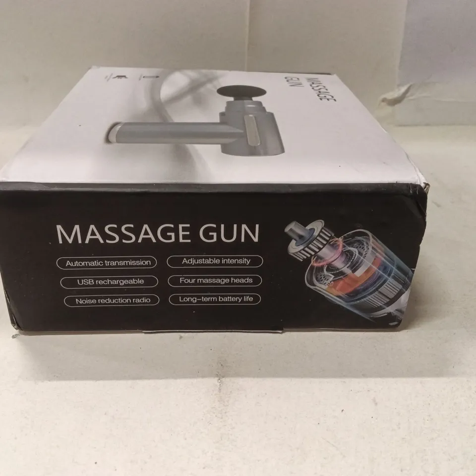 MASSAGE GUN WITH FOUR MASSAGE HEADS – USB RECHARGEABLE