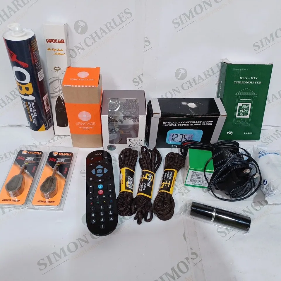 BOX TO CONTAIN APPROX. 25 X ASSORTED HOUSEHOLD PRODUCTS. INCLUDES TV REMOTE, SHOE STRING, SEALANT, CLOCKS ETC