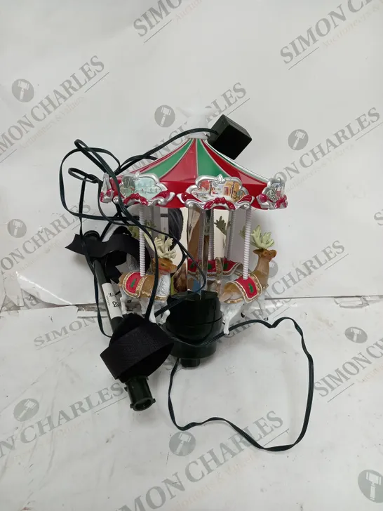 Lot 5304: MR. CHRISTMAS ANIMATED CAROUSEL TREE TOPPER - 4571321 | Simon ...