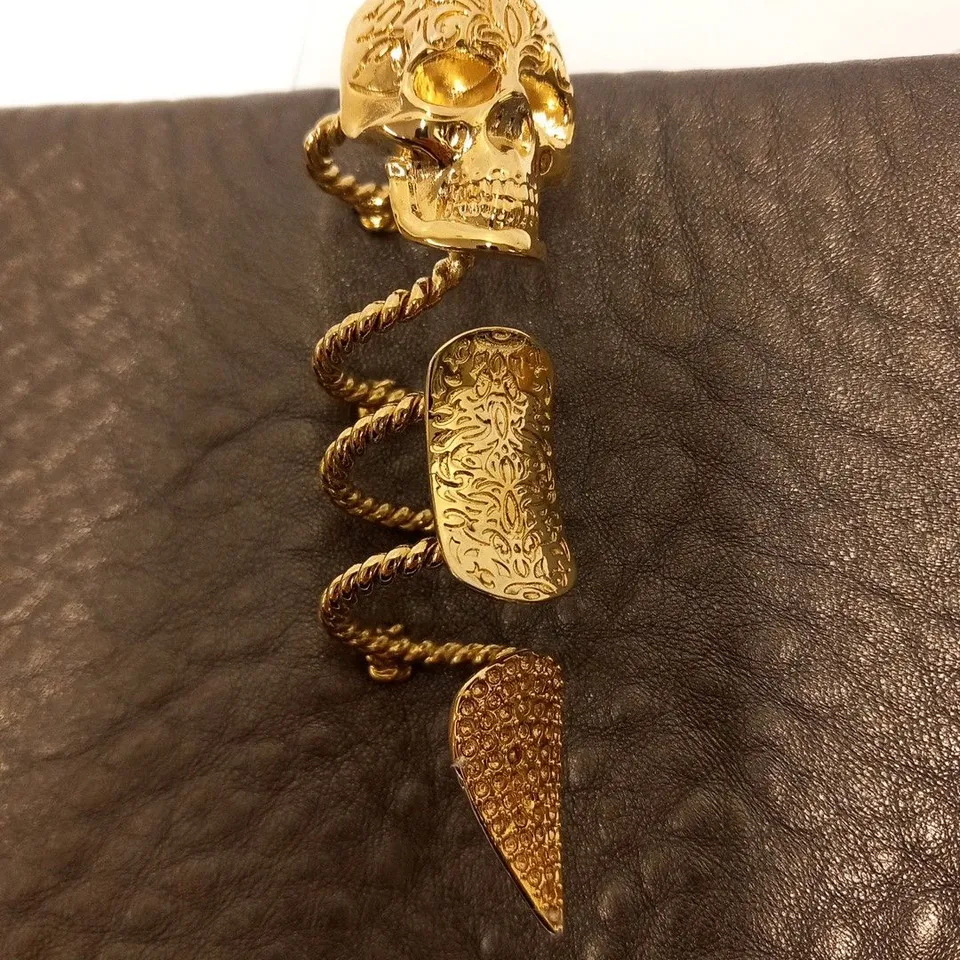 MAISON DU POSH LARGE SILVER CLUTCH BAG WITH GOLD SKULL RING HANDLE