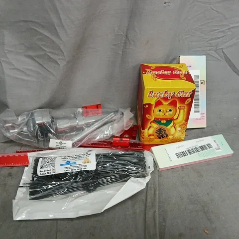 APPROXIMATELY 12 ASSORTED HOUSEHOLD ITEMS TO INCLUDE LUCKY CAT, GEL INK PENS, WIRE HANGERS, ETC
