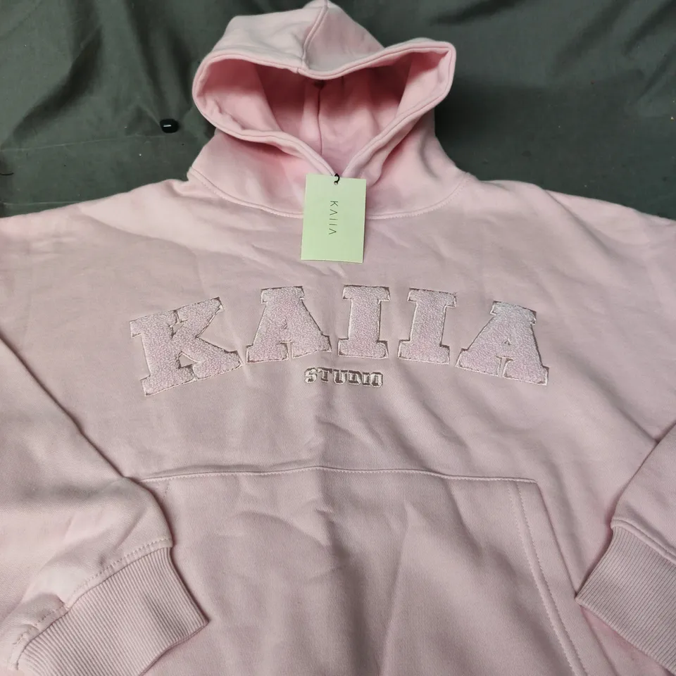 KAIA STUDIO BORG SLOGAN OVERSIZED HOODIE – PINK CHAI, UK SIZE 6