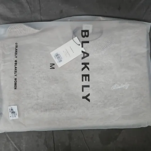 BAGGED BLAKELY SWEATER IN BEIGE SIZE MEDIUM