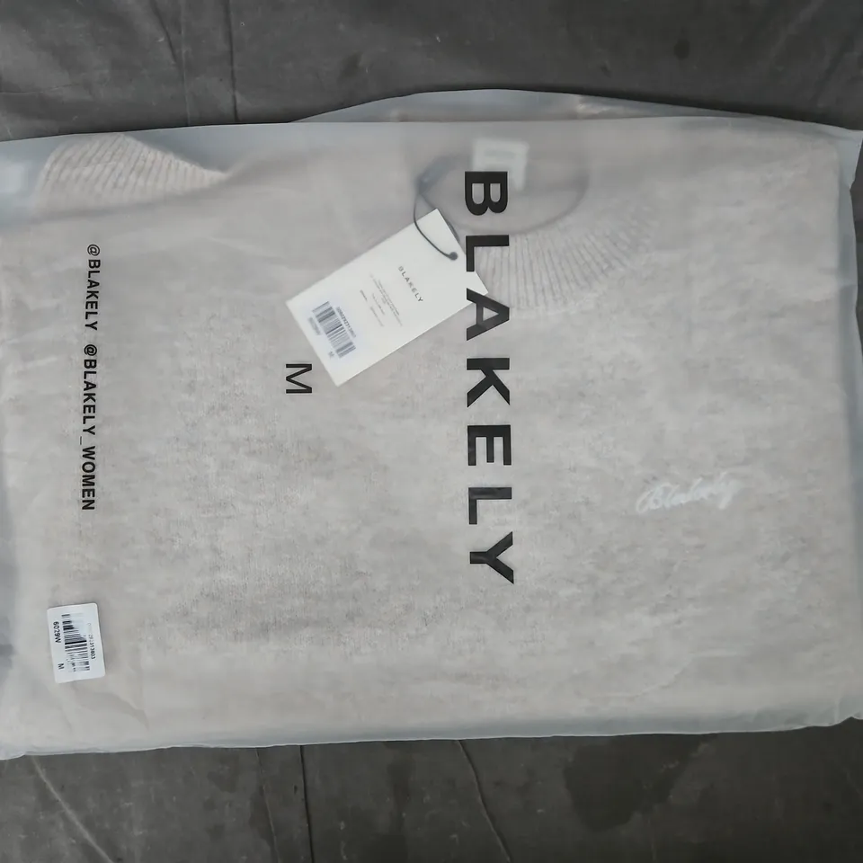 BAGGED BLAKELY SWEATER IN BEIGE SIZE MEDIUM