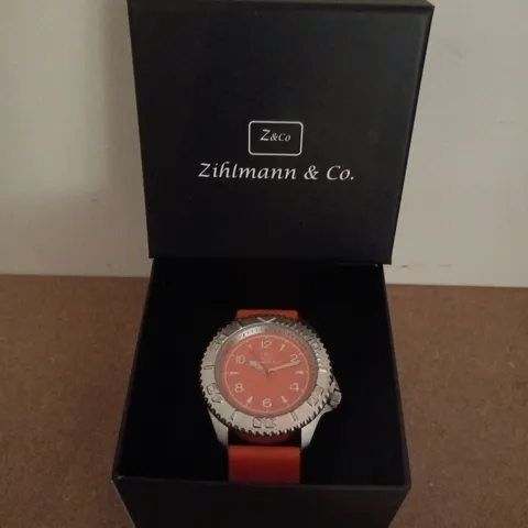 BOXED ZIHLMANN & CO STAINLESS STEEL WATCH WITH ORANGE DIAL & ORANGE RUBBER STRAP