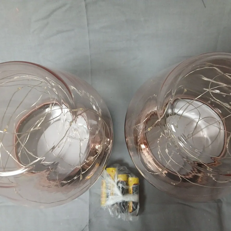 Pair of pink glass table lamps with chrome bases