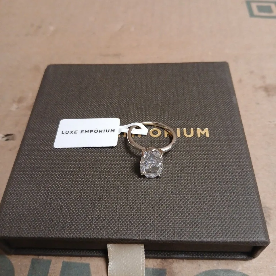 LUXE EMPORIUM RING WITH CLEAR STONE SIZE 5.5 BOXED