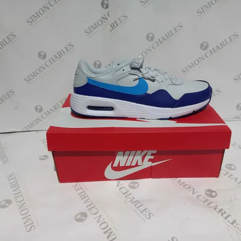 BOXED PAIR OF NIKE AIR MAX SC PURE PLATINUM/BLUE LIGHTING UK 14