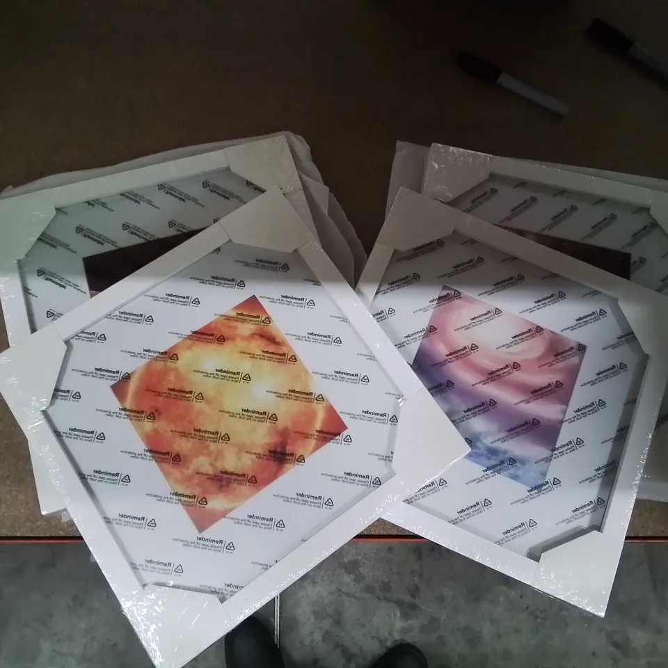 A BOX OF 4 10×10 PHOTO FRAMES IN WHITE