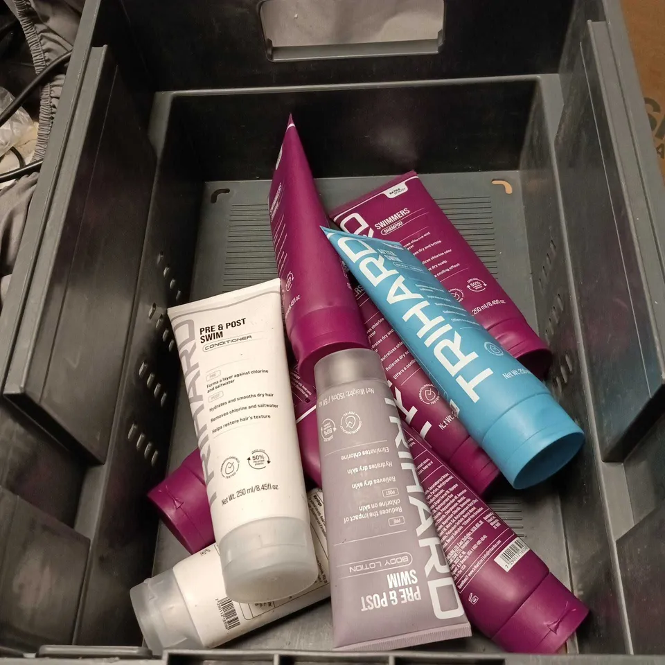 APPROXIMATELY 8 X TRIHARD SWIMMERS COSMETIC ITEMS TO INCLUDE SHAMPOO, CONDITIONER ETC