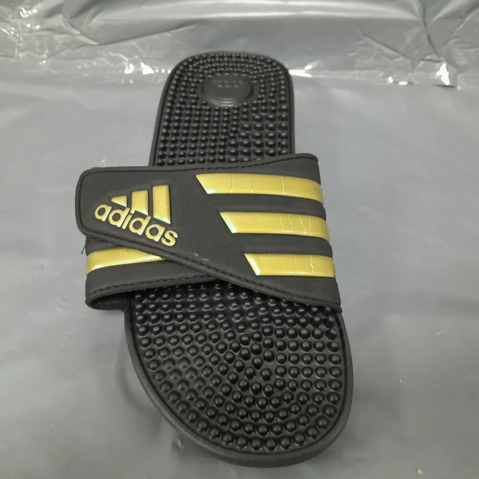 PAIR OF ADIDAS ADISSAGE SLIDERS IN BLACK/GOLD UK SIZE 9