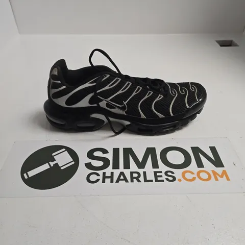 UNBOXED PAIR OF NIKE AIR MAX PLUS TN SNEAKERS IN A BLACK AND REFLECTIVE SILVER COLORWAY - UK 11.5