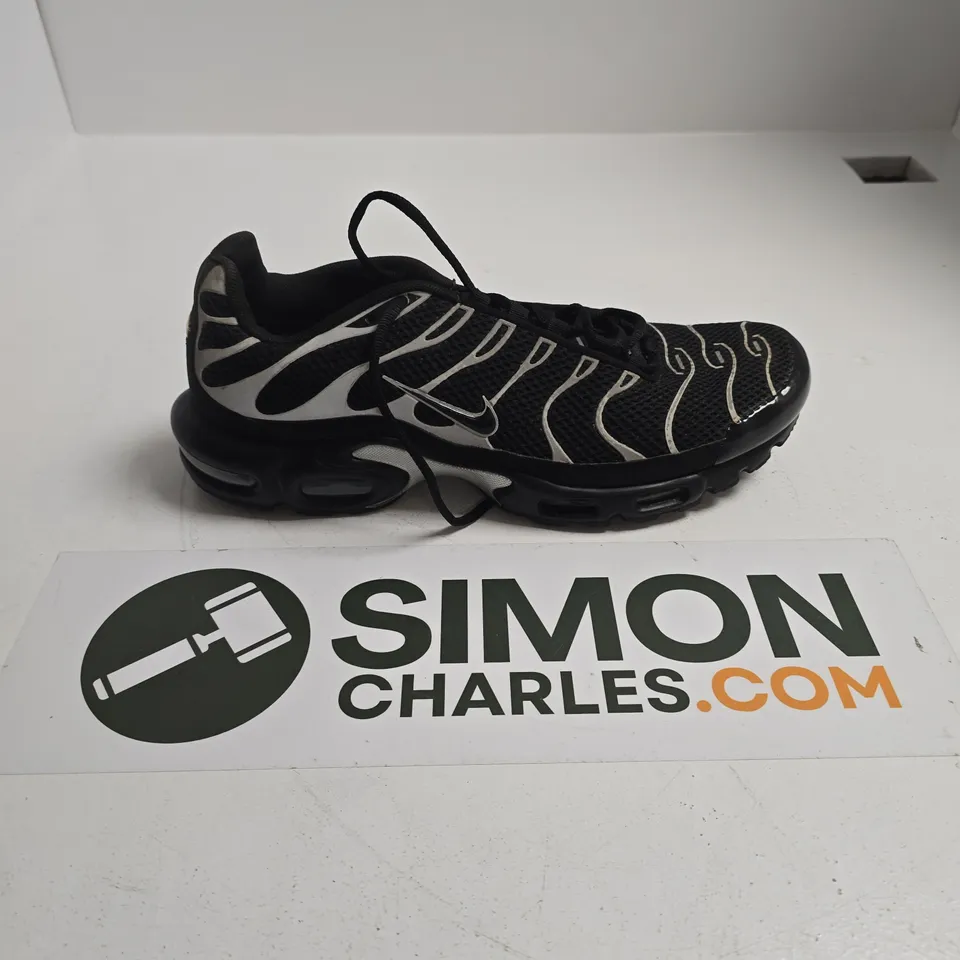 UNBOXED PAIR OF NIKE AIR MAX PLUS TN SNEAKERS IN A BLACK AND REFLECTIVE SILVER COLORWAY - UK 11.5