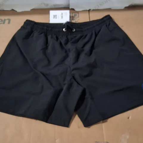 BOX CONTAINING APPROXIMATELY 9 MEN'S BRASS MONKEY BLACK SWIMMING SHORTS – XXL
