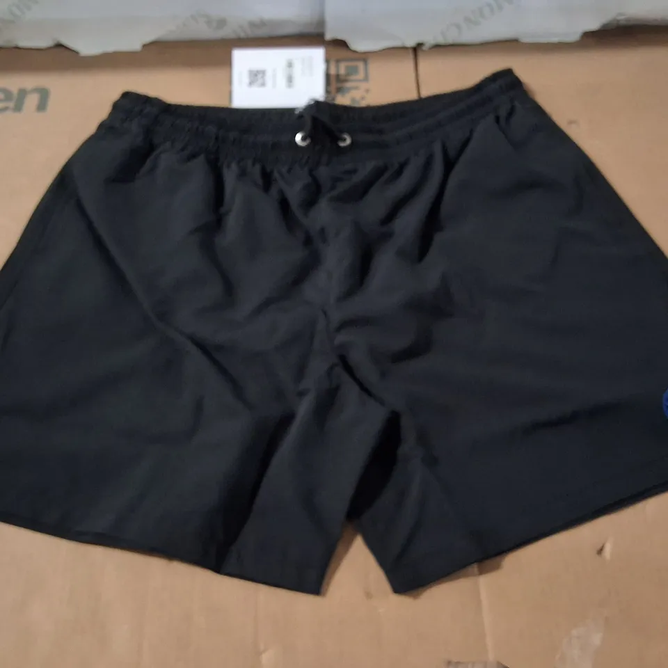 BOX CONTAINING APPROXIMATELY 9 MEN'S BRASS MONKEY BLACK SWIMMING SHORTS – XXL