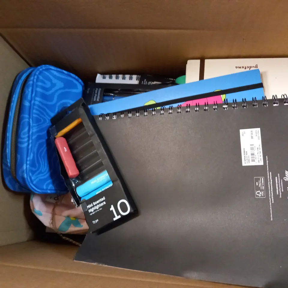 MEDIUM BOX OF ASSORTED NOTE BOOKS , SHARPIES AND PENCIL CASES 