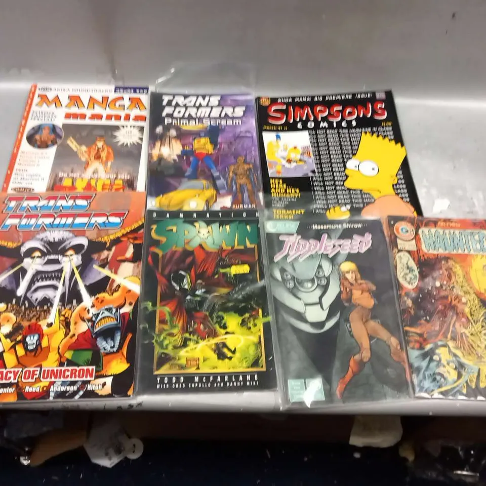 SEVEN ASSORTED COMICS TO INCLUDE; SIMPSONS, TRANSFORMERS, MANGA MANIA, TRANS FORMERS, SPAWN, HAUNTED AND APPLESEED