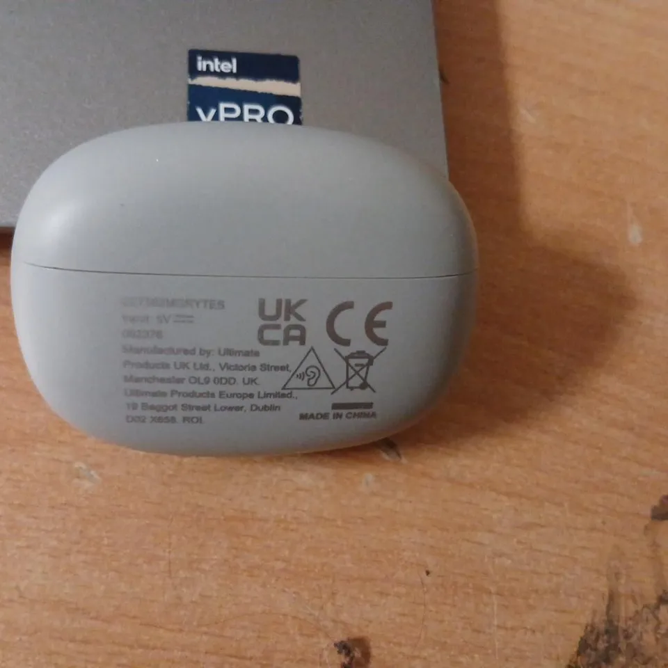 WIRELESS EARBUDS IN GREY CHARGING CASE