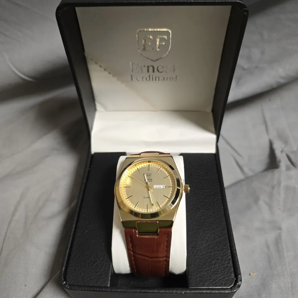 ERNEST FERDINAND GOLD TONE DIAL LEATHER STRAP WATCH 