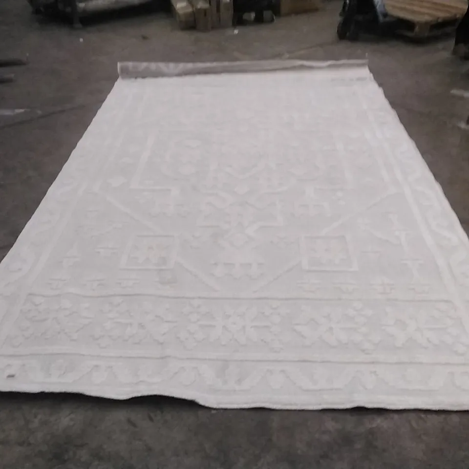 STILLAGE OF APPROXIMATELY 30 DESIGNER RUGS