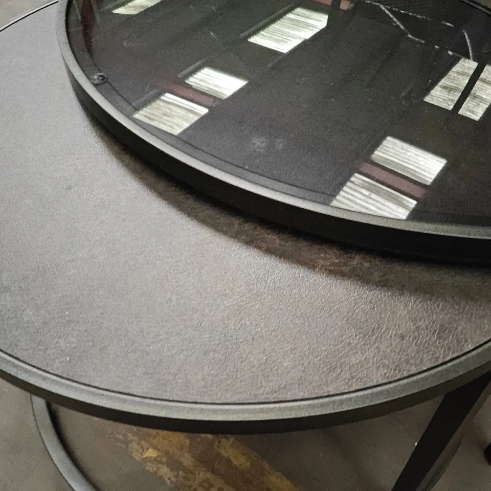 PAIR OF CIRCULAR GLASS TOPPED NESTING TABLES IN BLACK - DIAMETER 79CM
