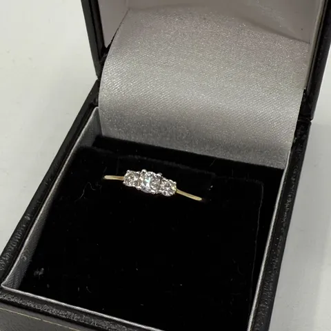 9CT GOLD THREE STONE RING SET WITH NATURAL DIAMONDS