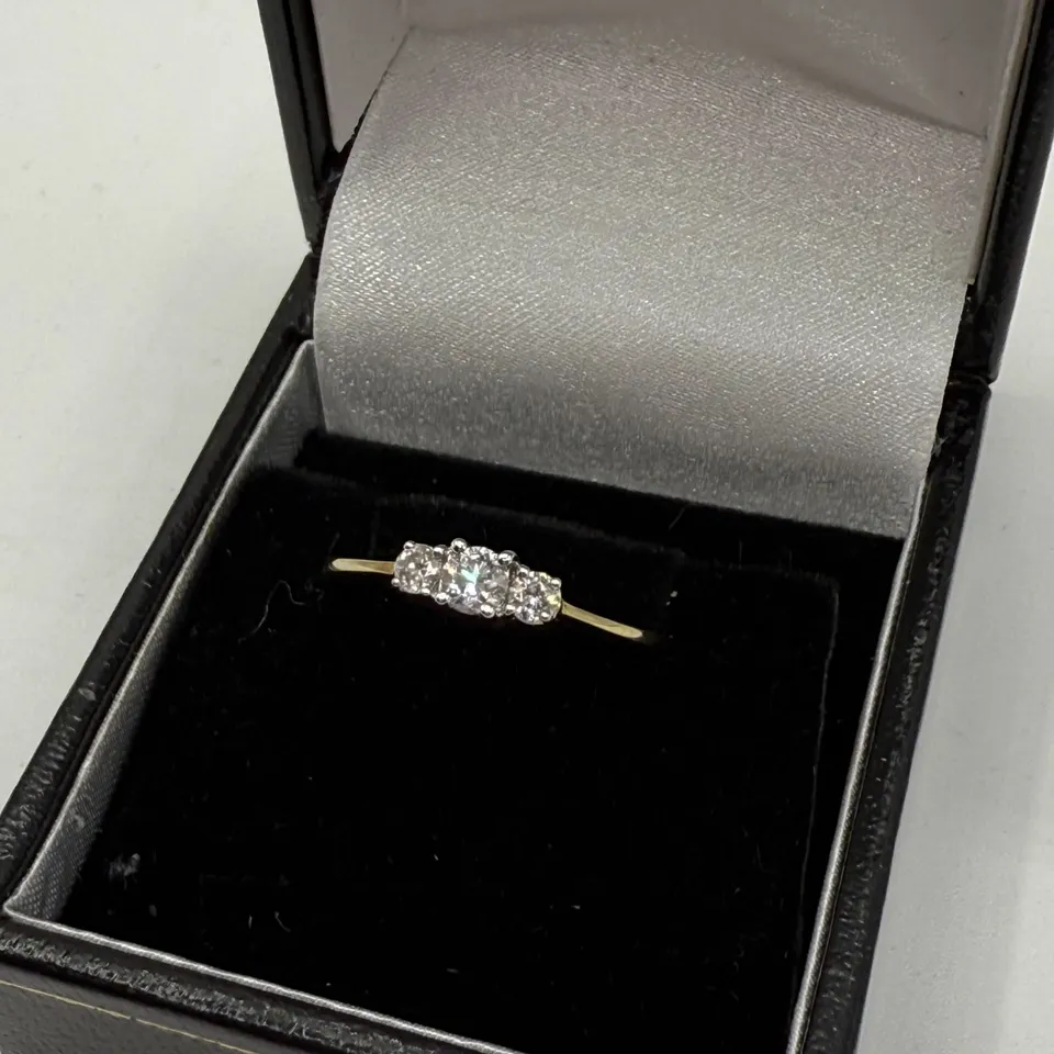 9CT GOLD THREE STONE RING SET WITH NATURAL DIAMONDS