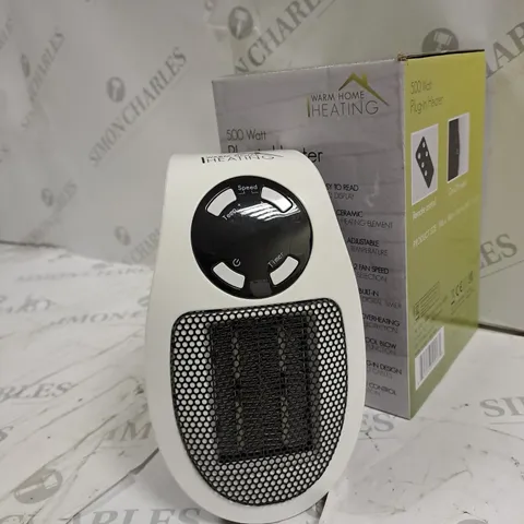 BOXED WARM HOME HEATING 500 WATT PLUG IN HEATER