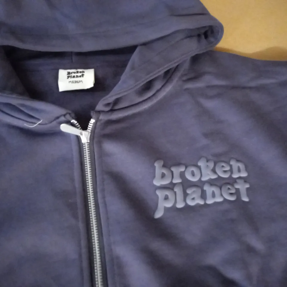 BROKEN PLANET PURPLE ZIP THROUGH HOODIE - M