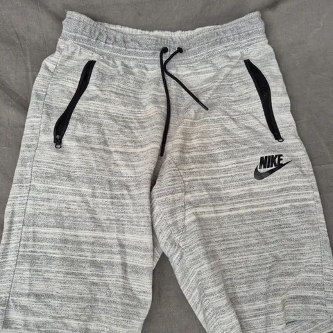 NIKE JOGGER SHORTS IN GREY SIZE MEDIUM
