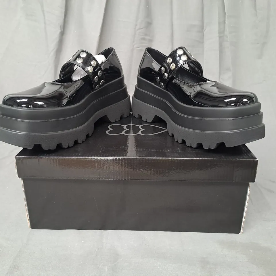 BOXED PAIR OF KOI CHUNKY PLATFORM SHOES IN GLOSSY BLACK SIZE 6