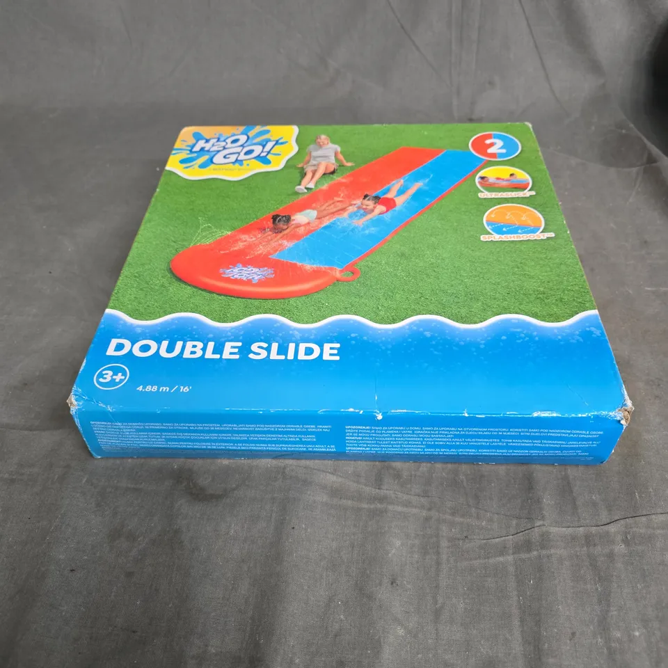 CAGE CONTAINING A LARGE QUANTITY OF KIDS TOYS AND GAMES TO INCLUDE BEST EVER DOUGH ART, KIDS KITCHEN SINK AND DISHES SET, H2O GO! DOUBLE SLIDE, HAPELLO MAGNETIC ANIMAL ALPHABET, HELLO KITTY PLUSH TOY 