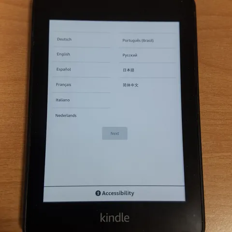 UNBOXED AMAZON KINDLE E-READER IN FOLIO CASE