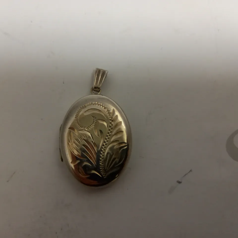 SILVER DECORATIVE LOCKET