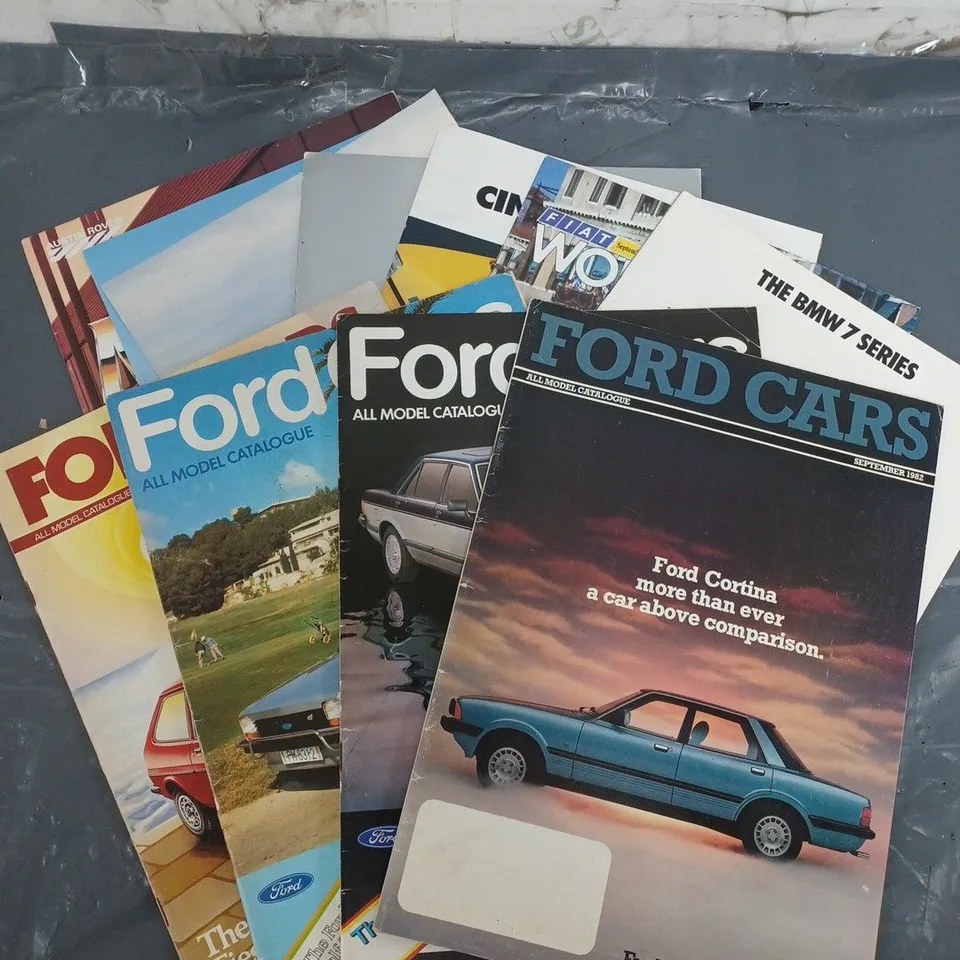 approx. 10 old car magazines from ford - fiat - citron   