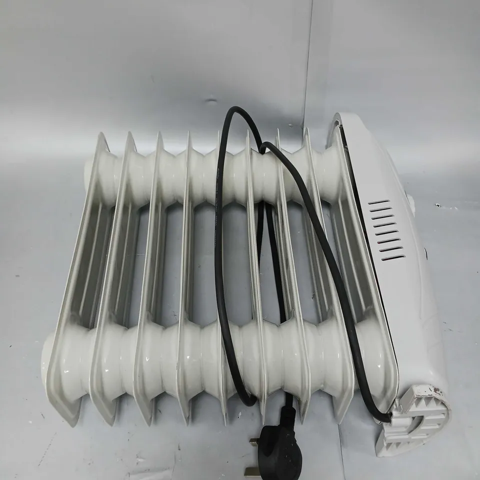 BOXED SWAN 1000W MINI OIL HEATER - WHITE RRP £29